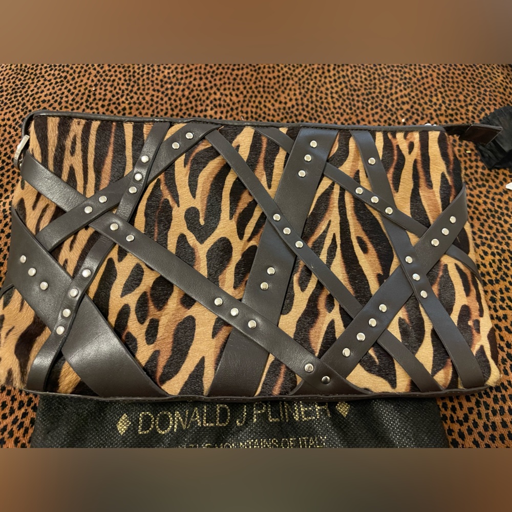 Donald J Pliner dark brown animal print, calf hair clutch. New worn, no tags.